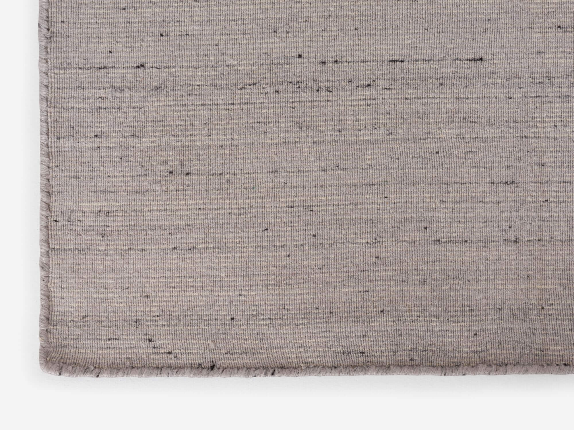 Large grey woven area rug detail view